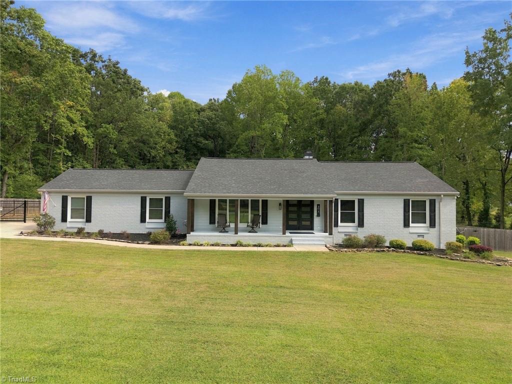 Photo of 307 Woodland Drive, Elon, NC 27244 (MLS # 1237340)