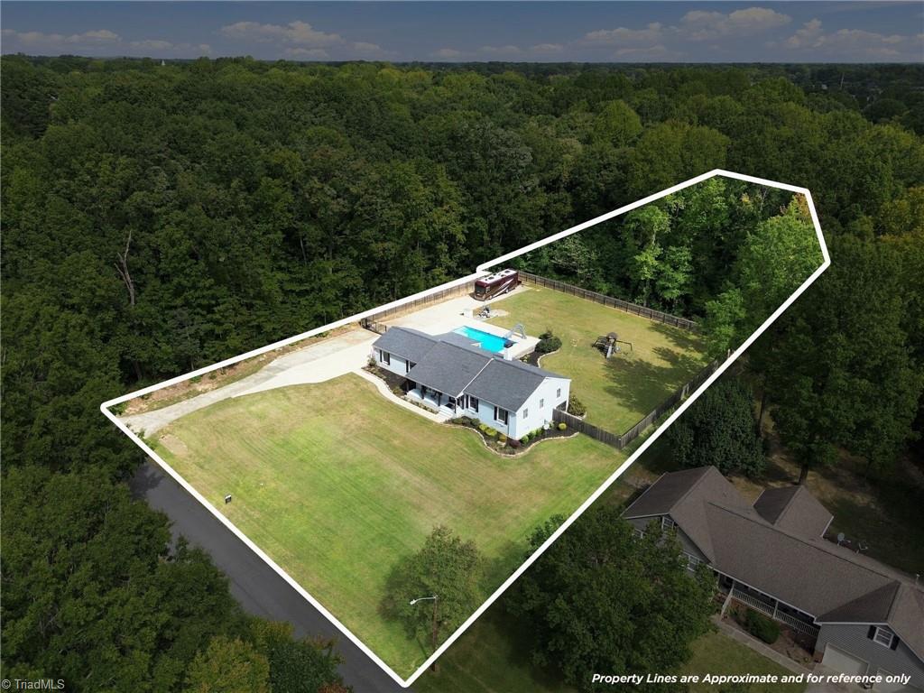 Photo of 307 Woodland Drive, Elon, NC 27244 (MLS # 1237340)