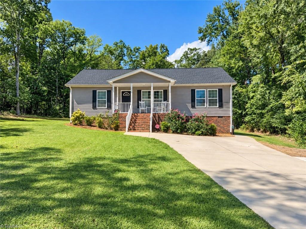 Photo of 205 Lake Drive, Biscoe, NC 27209 (MLS # 1235705)