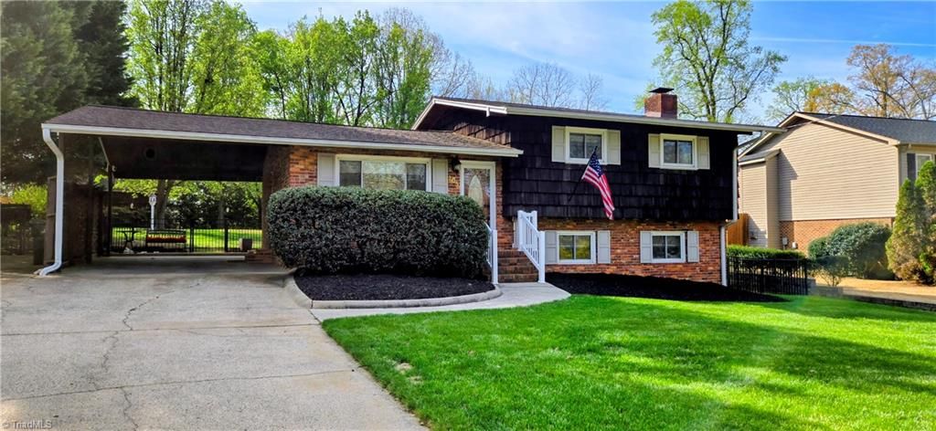 Photo of 105 Mendenhall Road, Jamestown, NC 27282 (MLS # 1213550)