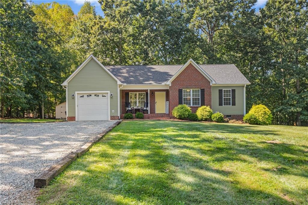 Photo of 206 Cushman Road, Gibsonville, NC 27249 (MLS # 1236914)