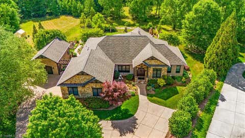 Homes For Sale - 7313 Autumn Lake Drive<br/> Summerfield, NC 27358