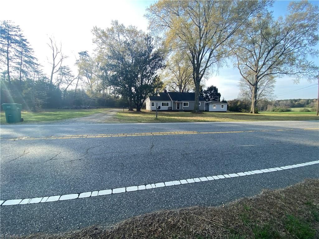 Photo of 7444 Nc Highway 65, Summerfield, NC 27358 (MLS # 1214025)
