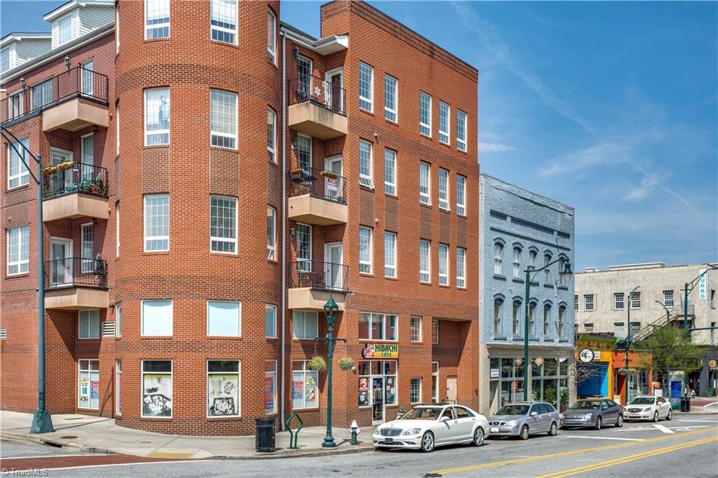 Photo of 306 S Elm Street #106, Greensboro, NC 27401 (MLS # 1237591)