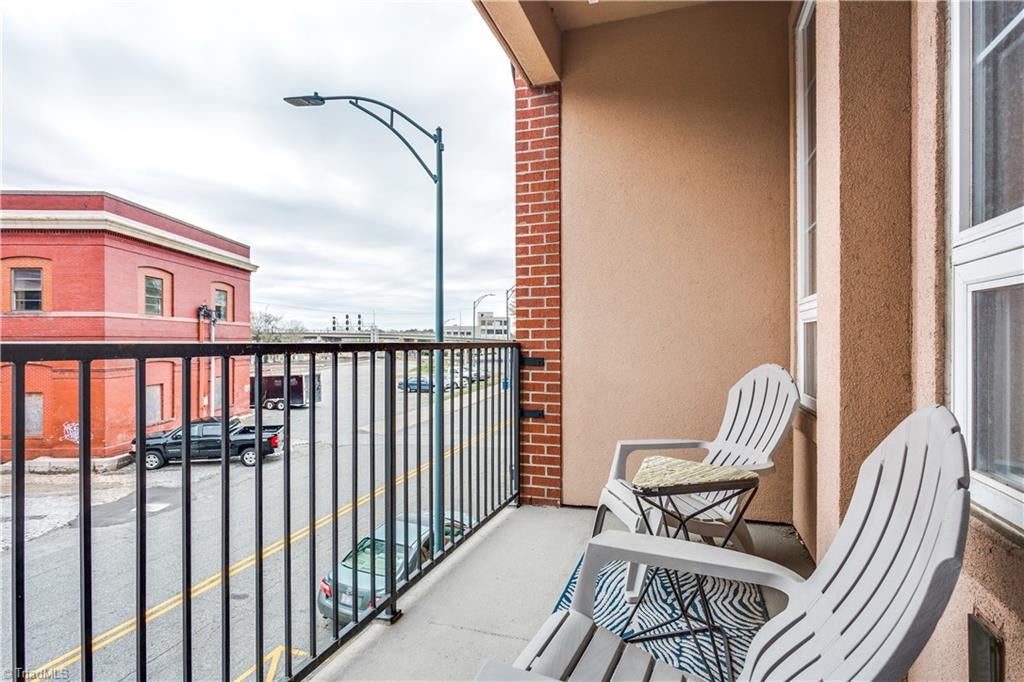 Photo of 306 S Elm Street #106, Greensboro, NC 27401 (MLS # 1237591)
