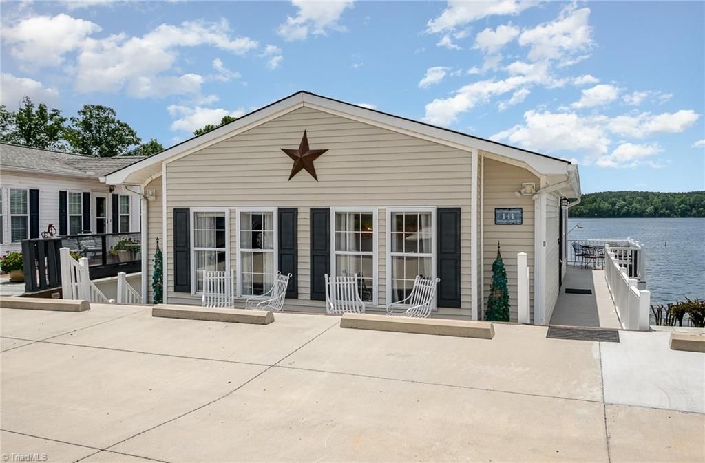 Photo of 141 Badin Lake Circle, New London, NC 28127 (MLS # 1213452)