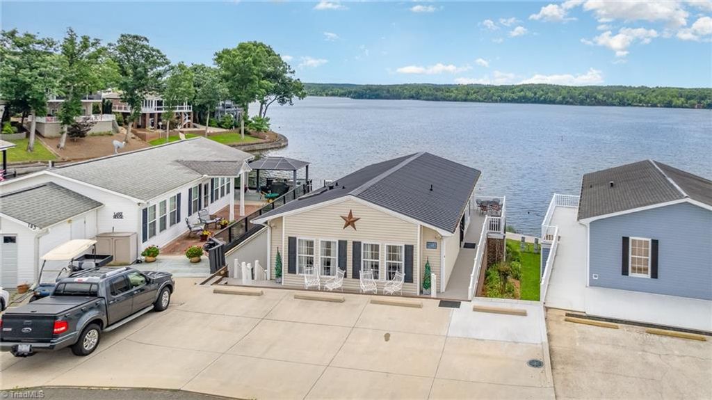 Photo of 141 Badin Lake Circle, New London, NC 28127 (MLS # 1213452)