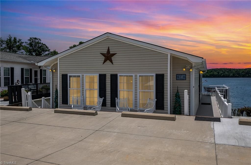 Photo of 141 Badin Lake Circle, New London, NC 28127 (MLS # 1213452)