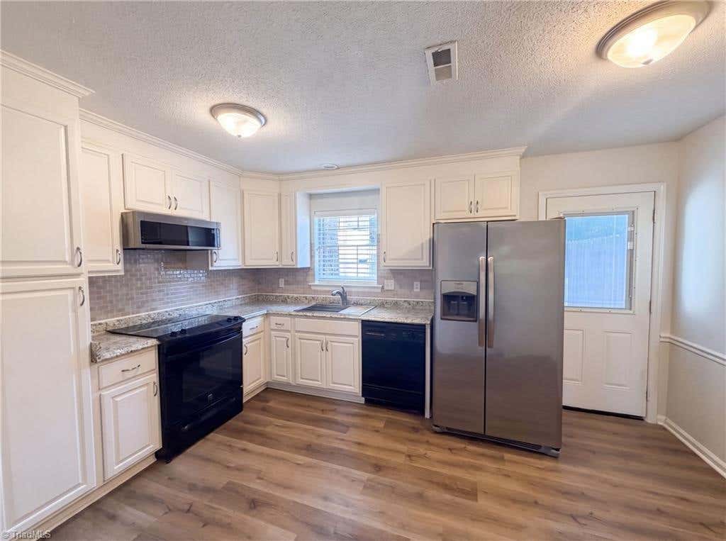Photo of 1311 Meadowview Road #B, Greensboro, NC 27403 (MLS # 1230744)
