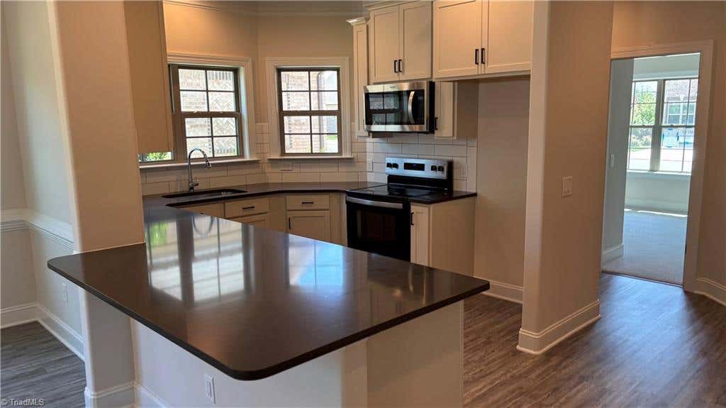 Photo of 1042 Beechcraft Drive, Mebane, NC 27302 (MLS # 1230766)