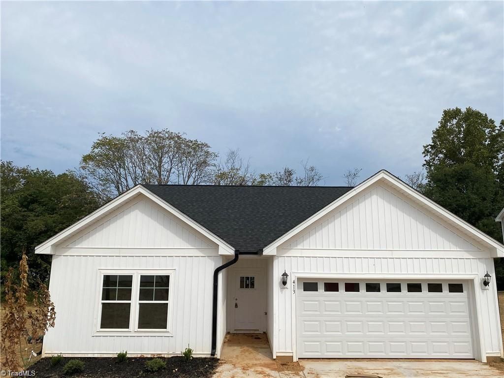 Photo of 413 E Lee Avenue, Yadkinville, NC 27055 (MLS # 1217084)