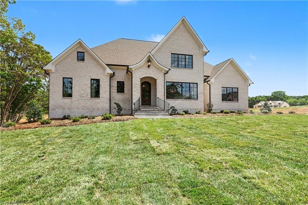 Photo of 7126 Lion's Gate Drive, Greensboro, NC 27455 (MLS # 1173268)