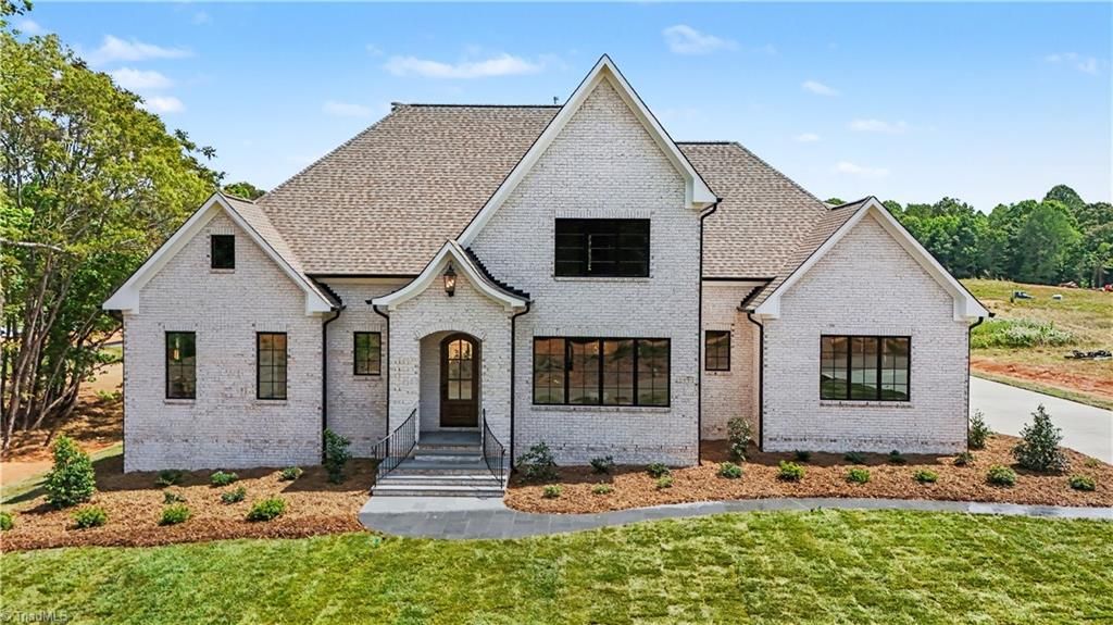 Photo of 7126 Lion's Gate Drive, Greensboro, NC 27455 (MLS # 1173268)