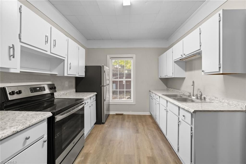 Photo of 1004 Highland Avenue, Greensboro, NC 27403 (MLS # 1210396)