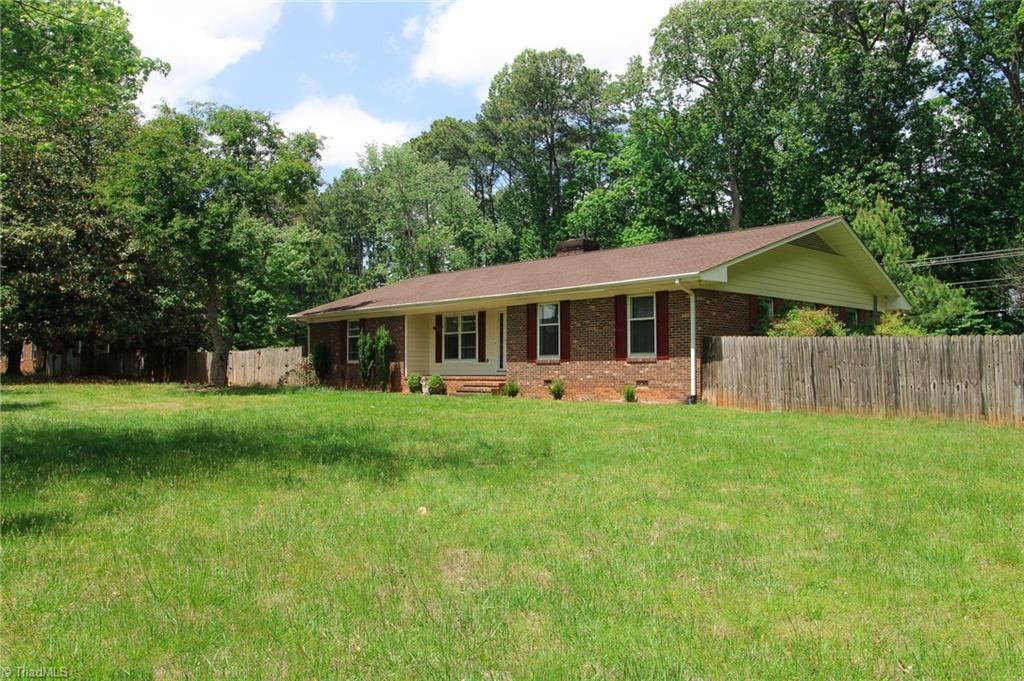 Photo of 8012 Tam Oshanter Drive, Greensboro, NC 27409 (MLS # 1218116)
