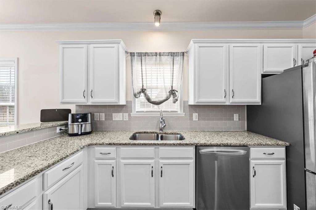 Photo of 1811 Challenge Drive, Graham, NC 27253 (MLS # 1212604)