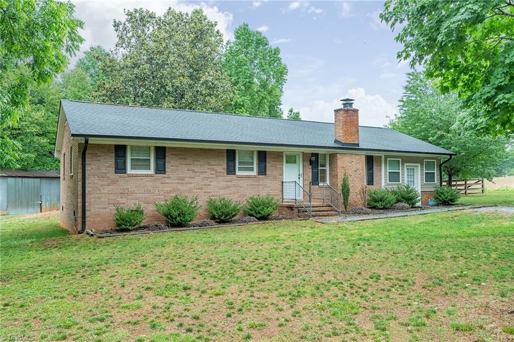 Photo of 5947 Poley Road, Browns Summit, NC 27214 (MLS # 1221903)