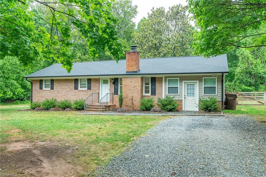 Photo of 5947 Poley Road, Browns Summit, NC 27214 (MLS # 1221903)