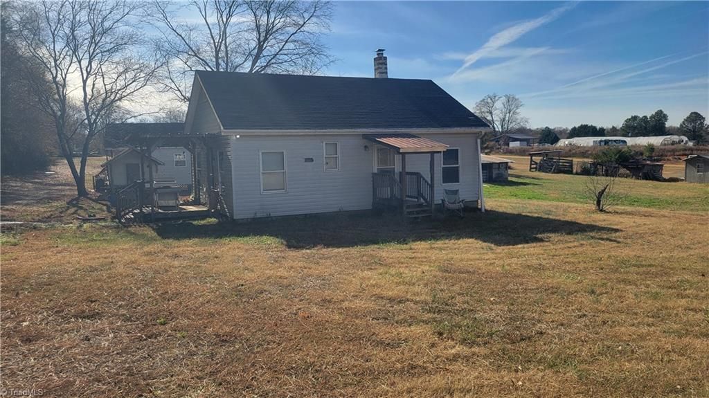 Photo of 4055 E Greensboro Chapel Hill Road, Graham, NC 27253 (MLS # 1204317)