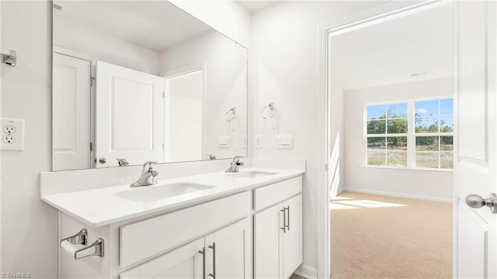 Photo of 7135 Royal Ascot Drive, Whitsett, NC 27377 (MLS # 1208447)