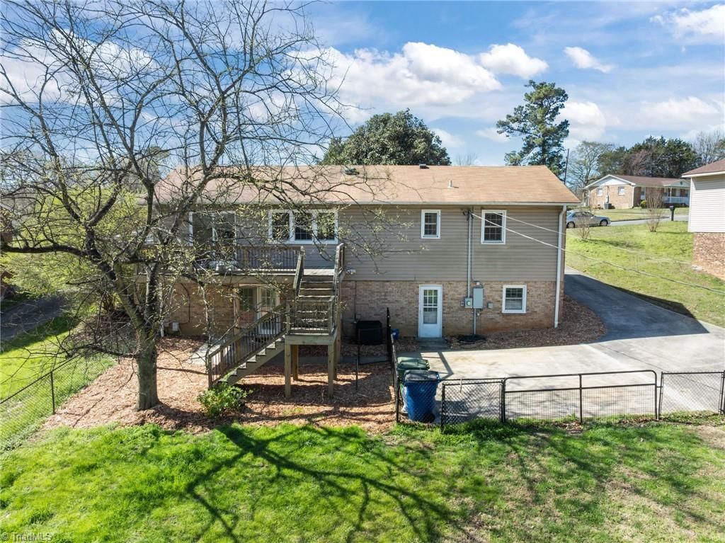 Photo of 304 Eastway Lane, Graham, NC 27253 (MLS # 1211937)