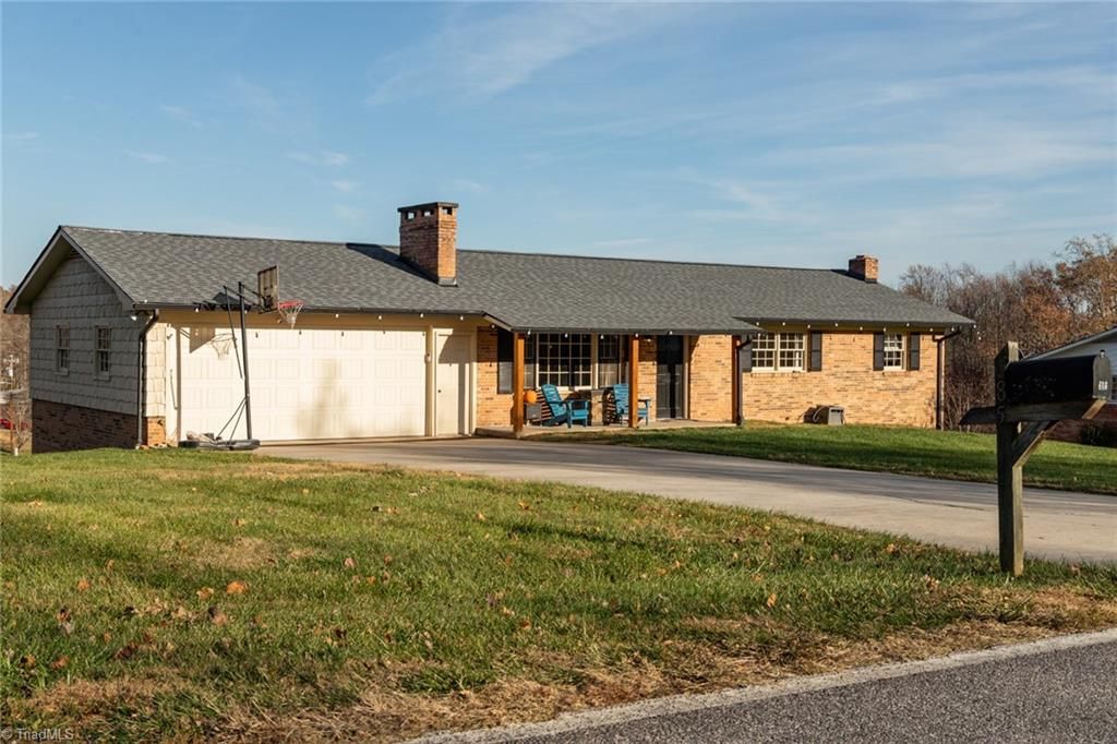 Photo of 585 Green Acres Road, Millers Creek, NC 28665 (MLS # 1204138)