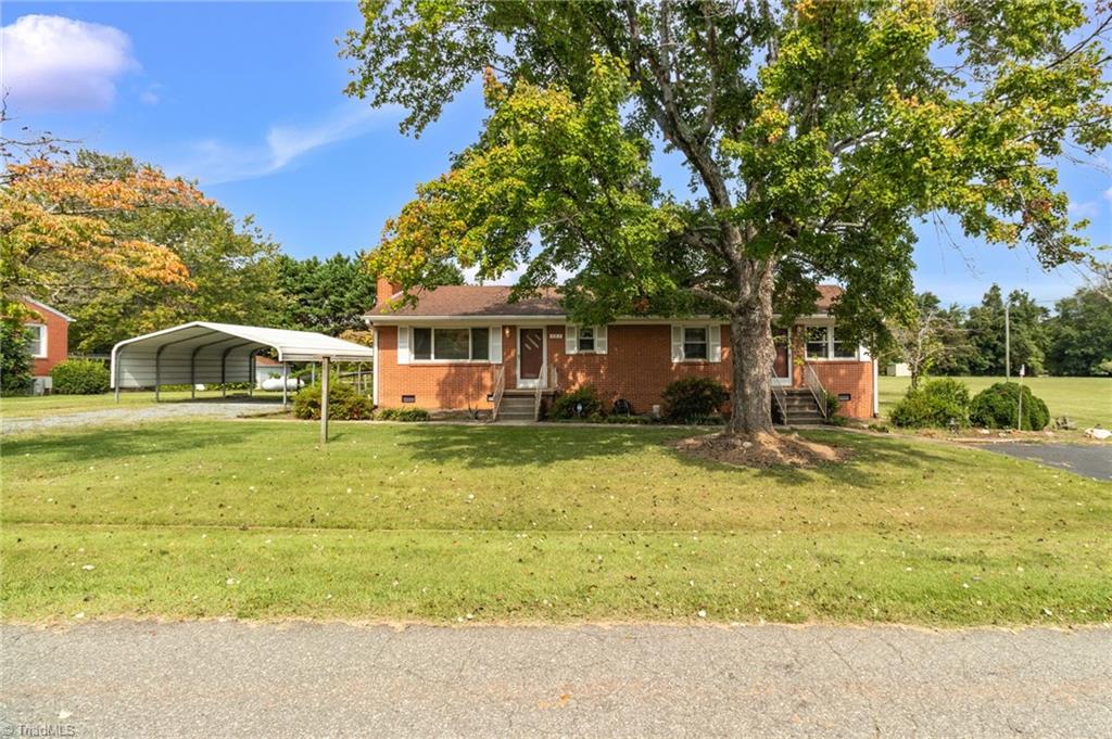 Photo of 553 E Ridge Avenue, Liberty, NC 27298 (MLS # 1236878)