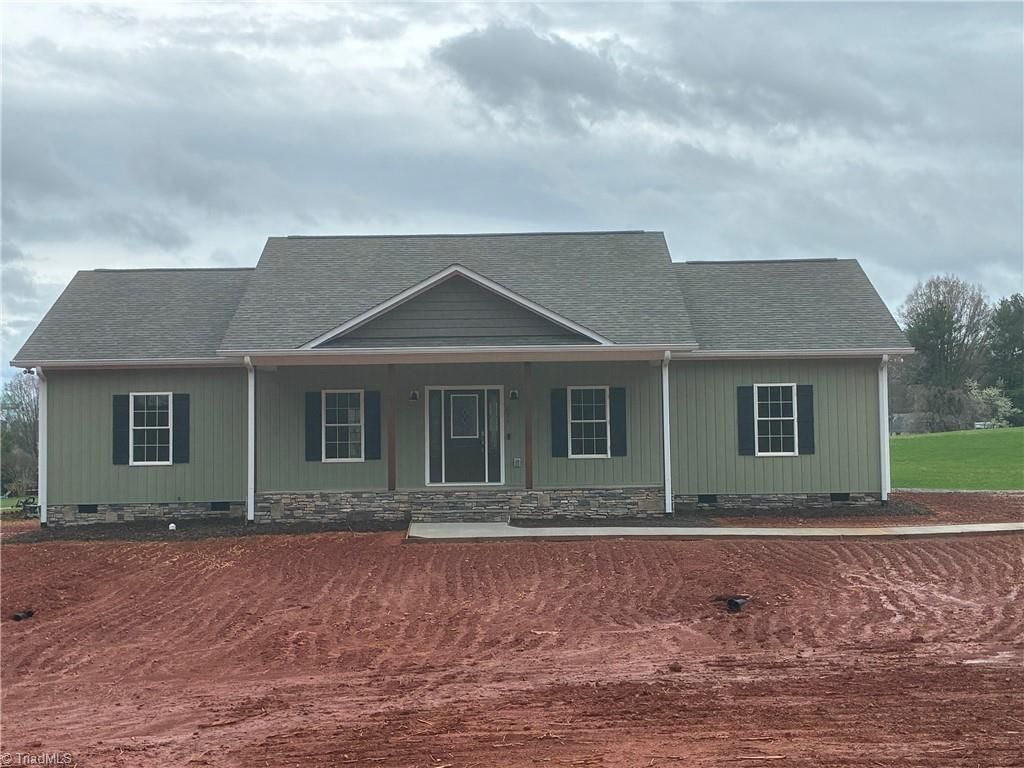 Photo of 621 W Atkins Street, Dobson, NC 27017 (MLS # 1212558)