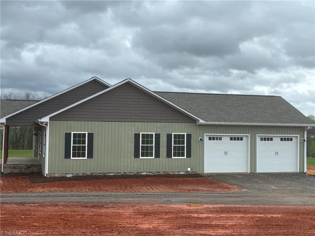 Photo of 621 W Atkins Street, Dobson, NC 27017 (MLS # 1212558)