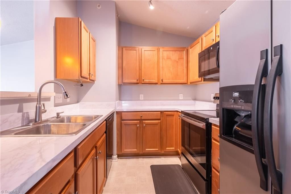 Photo of 4701 Pennoak Lane #M, Greensboro, NC 27407 (MLS # 1209182)