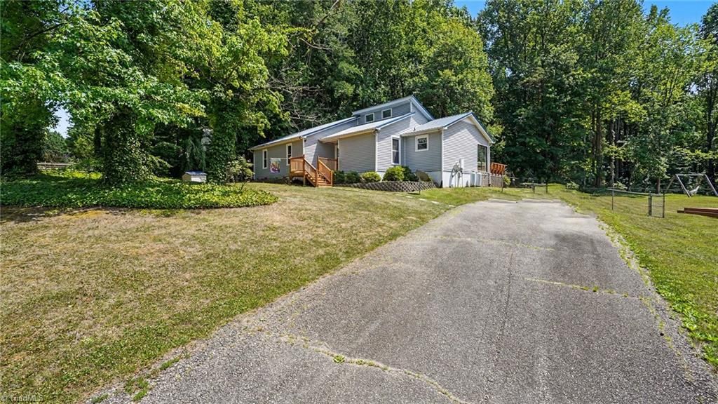 Photo of 6594 Riverwood Road, Walkertown, NC 27051 (MLS # 1224896)