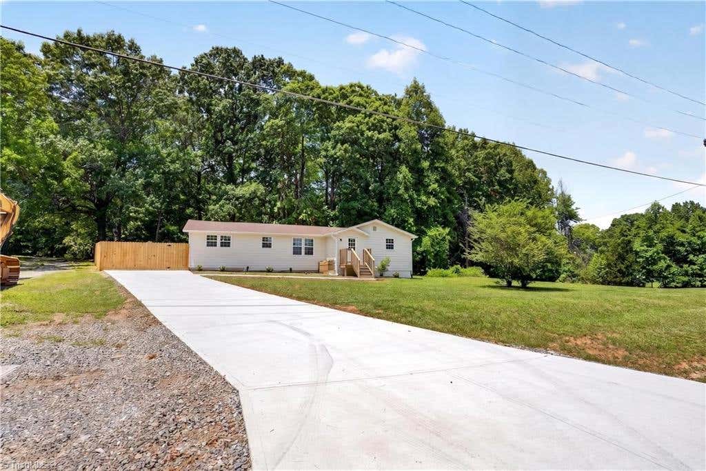 Photo of 1724 Rock Creek Dairy Road, Whitsett, NC 27377 (MLS # 1226579)