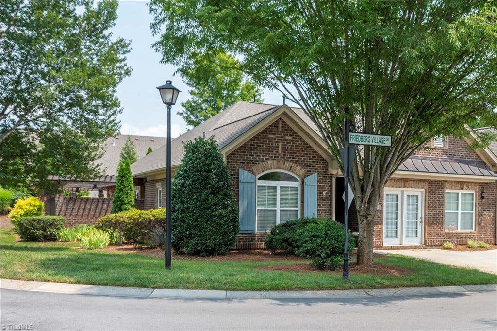 Photo of 201 Friedberg Village Drive, Winston-Salem, NC 27127 (MLS # 1229030)