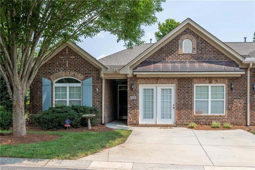 Photo of 201 Friedberg Village Drive, Winston-Salem, NC 27127 (MLS # 1229030)