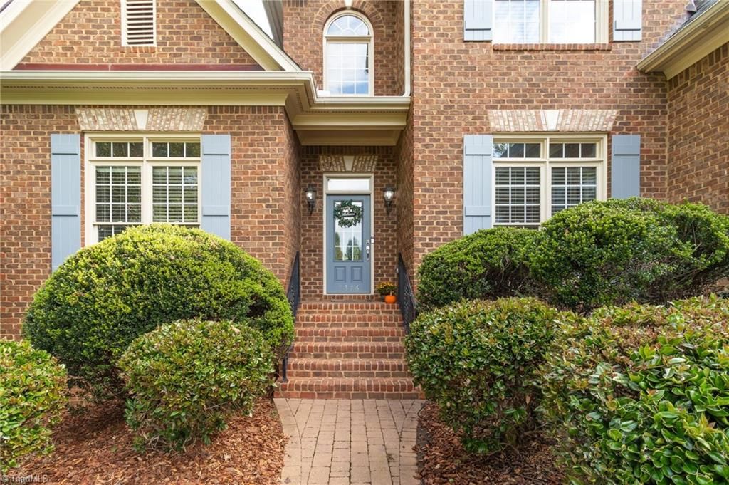 Photo of 7376 Henson Forest Drive, Summerfield, NC 27358 (MLS # 1198700)