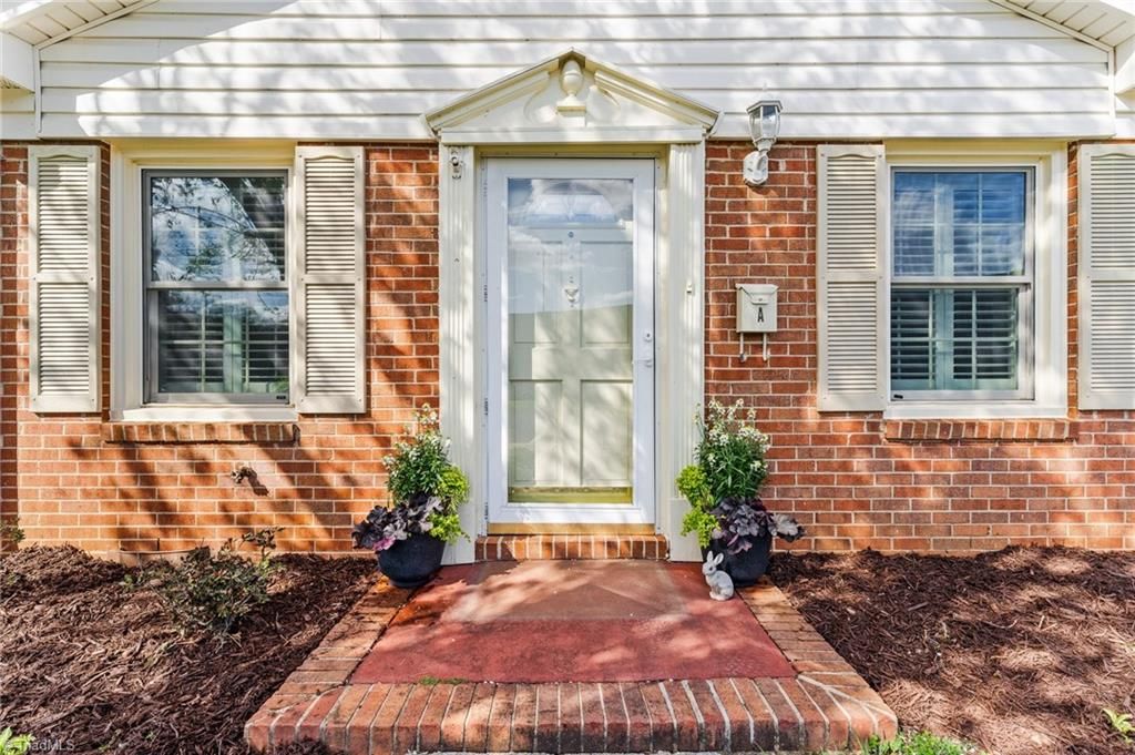 Photo of 3303 Regents Park Lane #A, Greensboro, NC 27455 (MLS # 1212657)