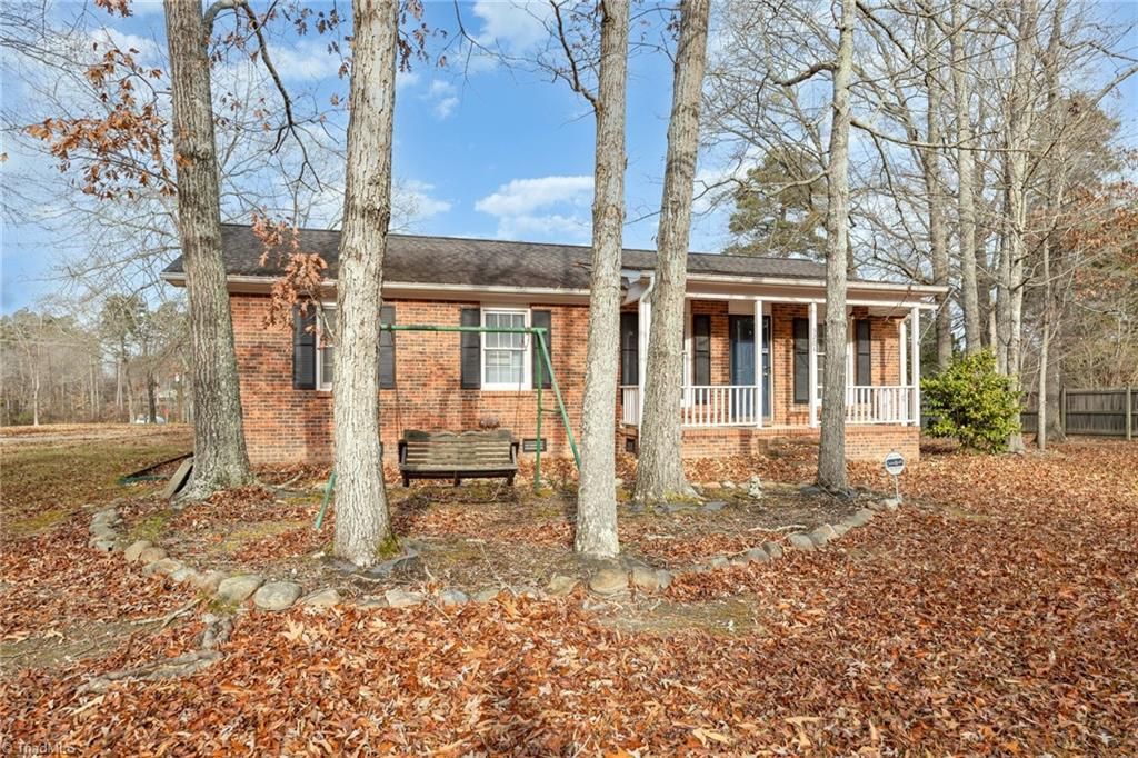 Photo of 5204 Woodlane Drive, Julian, NC 27283 (MLS # 1203926)