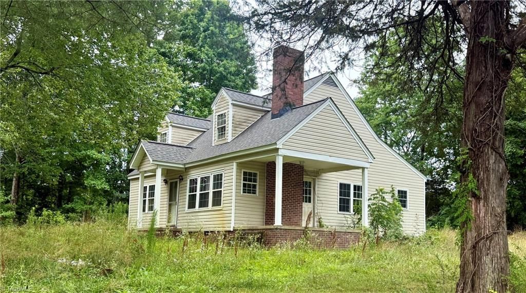 Photo of 1132 Ben Sharpe Road, Elon, NC 27244 (MLS # 1225231)