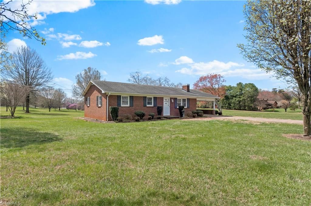 Photo of 610 Nc Highway 67, Boonville, NC 27011 (MLS # 1212727)