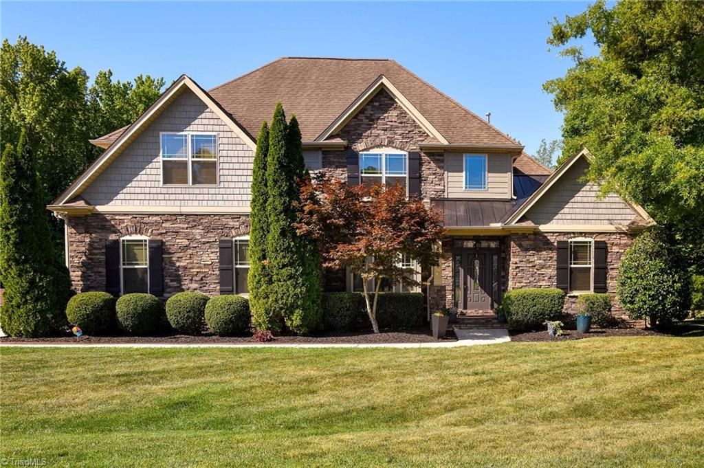 Photo of 8931 Grove Park Drive, Oak Ridge, NC 27310 (MLS # 1219983)