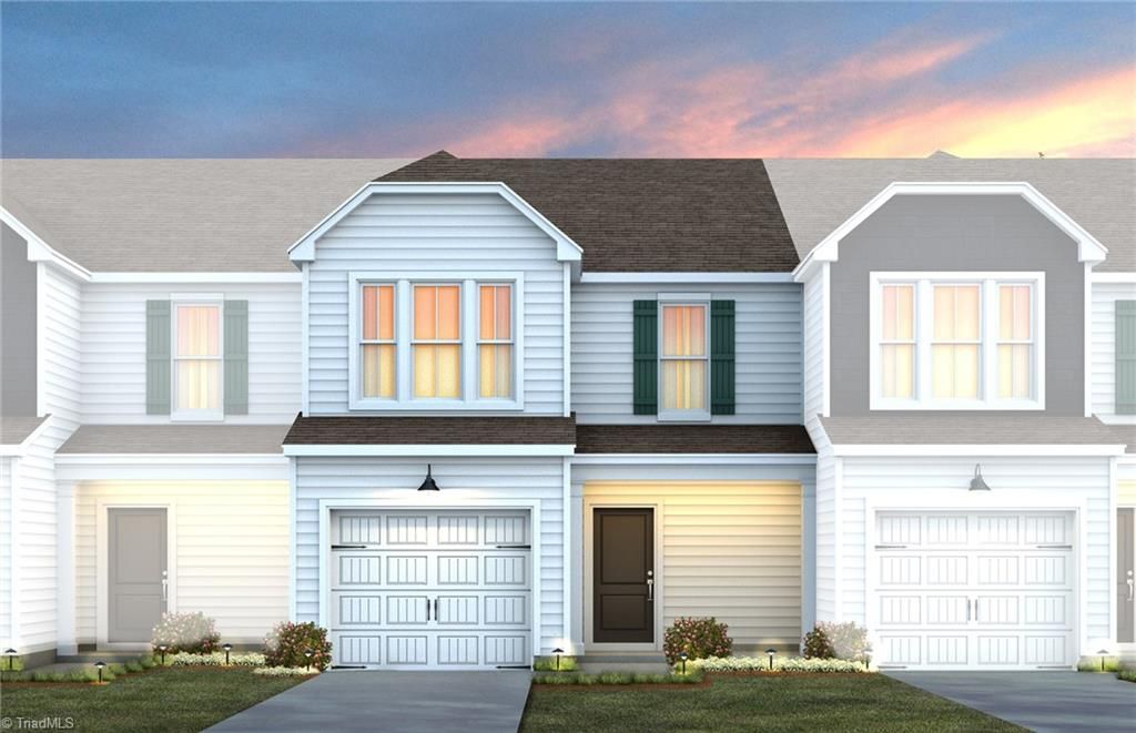 Photo of 1024 Poets Walk Road, Whitsett, NC 27377 (MLS # 1203900)