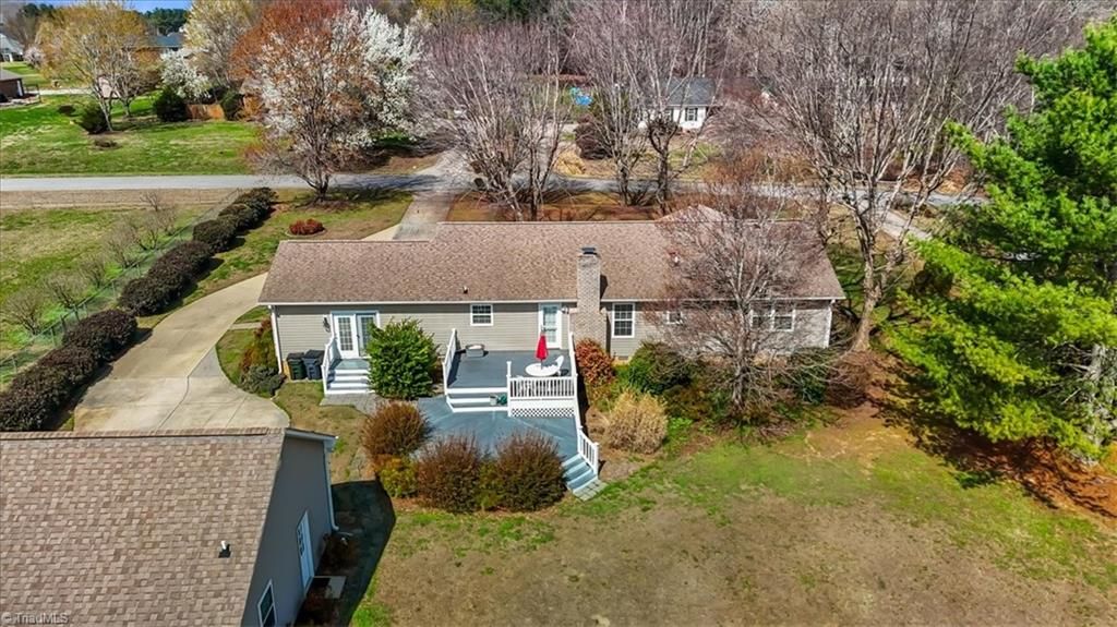 Photo of 8997 Pepper Ridge Court, Oak Ridge, NC 27310 (MLS # 1212154)