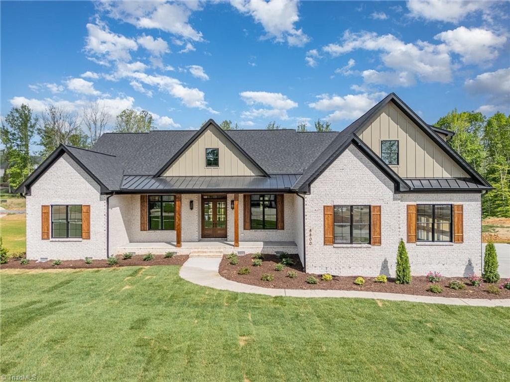 Photo of 8800 Knoll Creek Court, Oak Ridge, NC 27310 (MLS # 1165459)