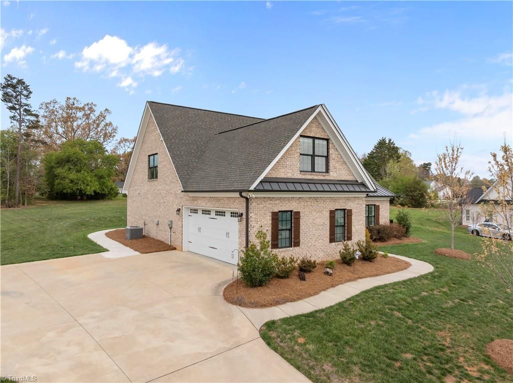Photo of 8463 Meadow Vista Drive, Lewisville, NC 27023 (MLS # 1214576)