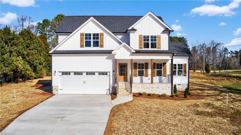 Photo of 303 Country Club Drive, Stoneville, NC 27048 (MLS # 1204464)