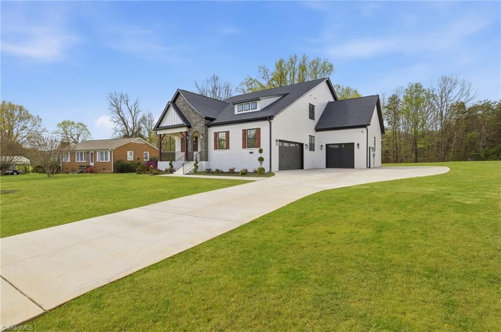 Photo of 5933 N Church Street, Greensboro, NC 27455 (MLS # 1214668)