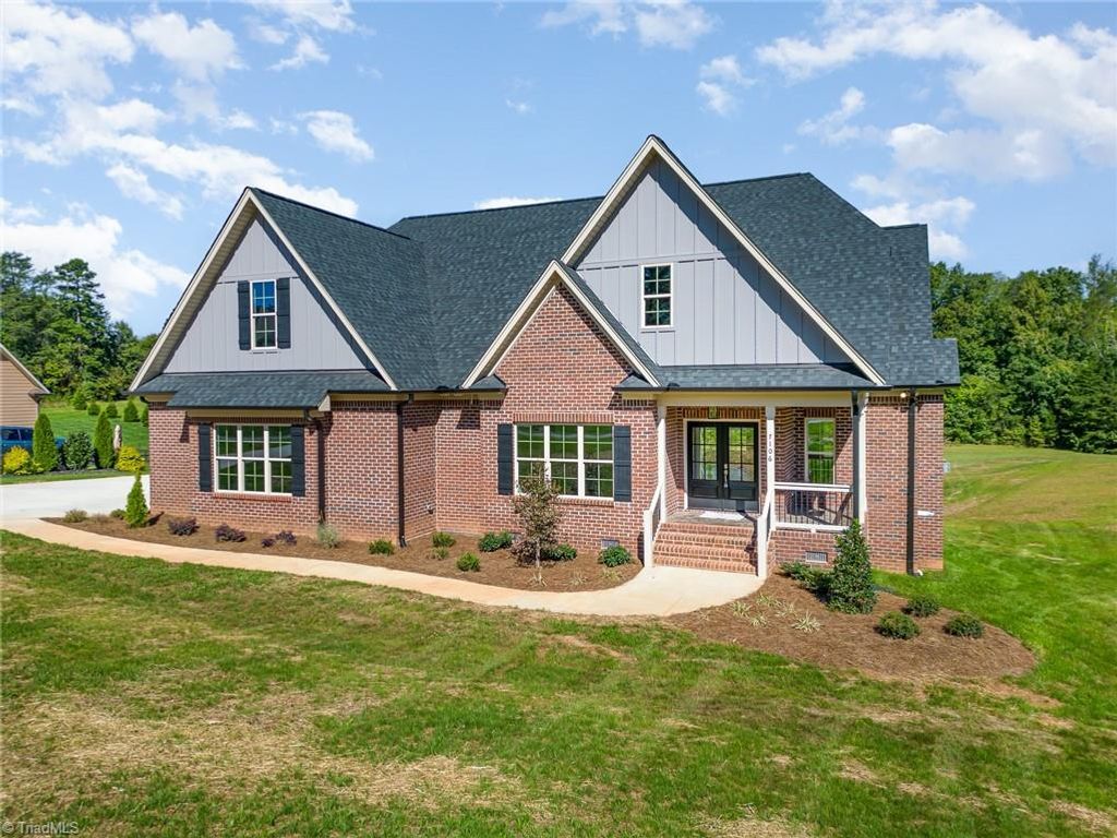 Photo of 7106 Lambert Lake Road, Stokesdale, NC 27357 (MLS # 1218556)