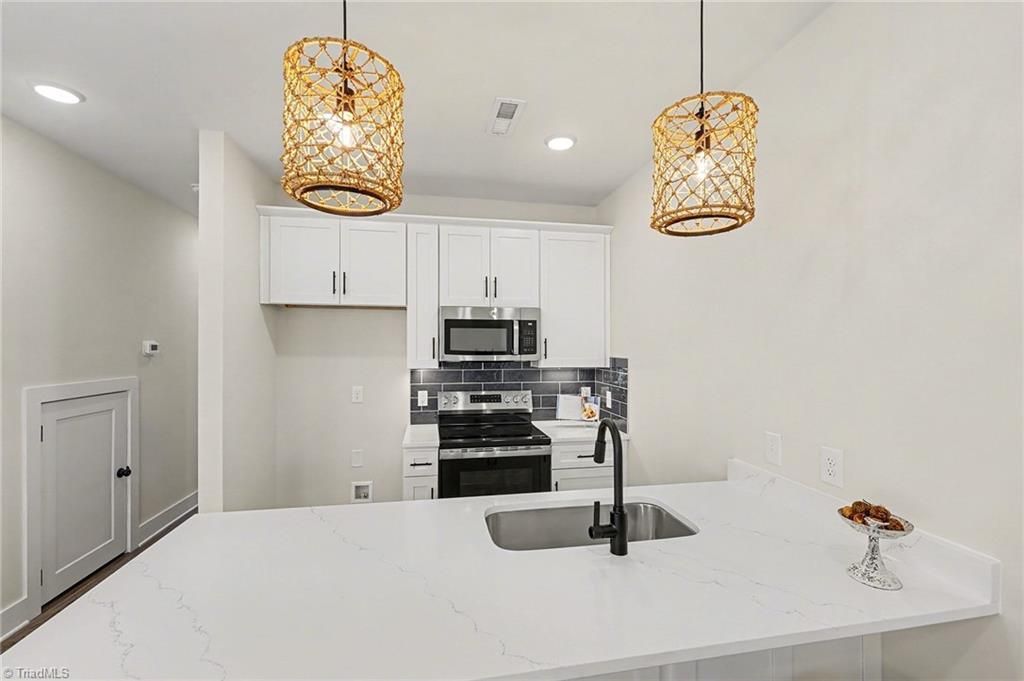 Photo of 4661 Canter Park Lane, Greensboro, NC 27410 (MLS # 1207954)