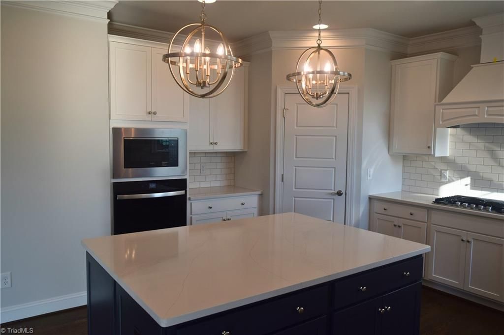 Photo of 8113 Simon Drive, Stokesdale, NC 27357 (MLS # 1182619)
