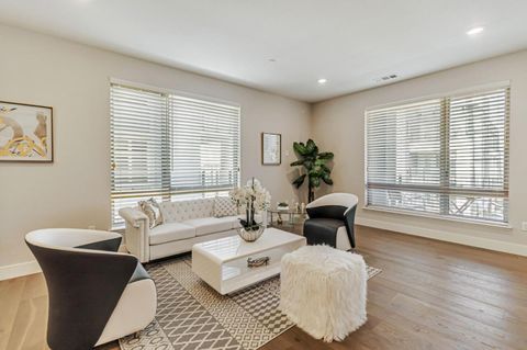 Photo of 1028 Foster Square Lane #305, FOSTER CITY, CA 94404 (MLS # ML82022798)